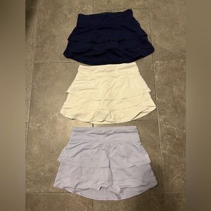 Set of three girls Athleta Swing Skorts. EUC. Size 8-10 (medium)
